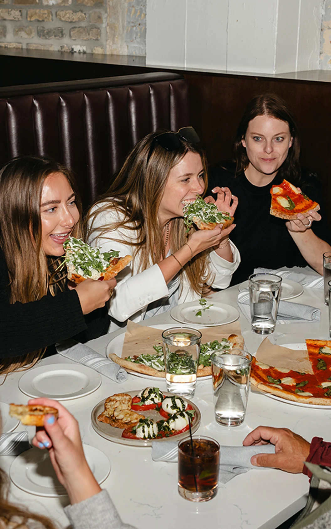 Large group of colleagues dining together