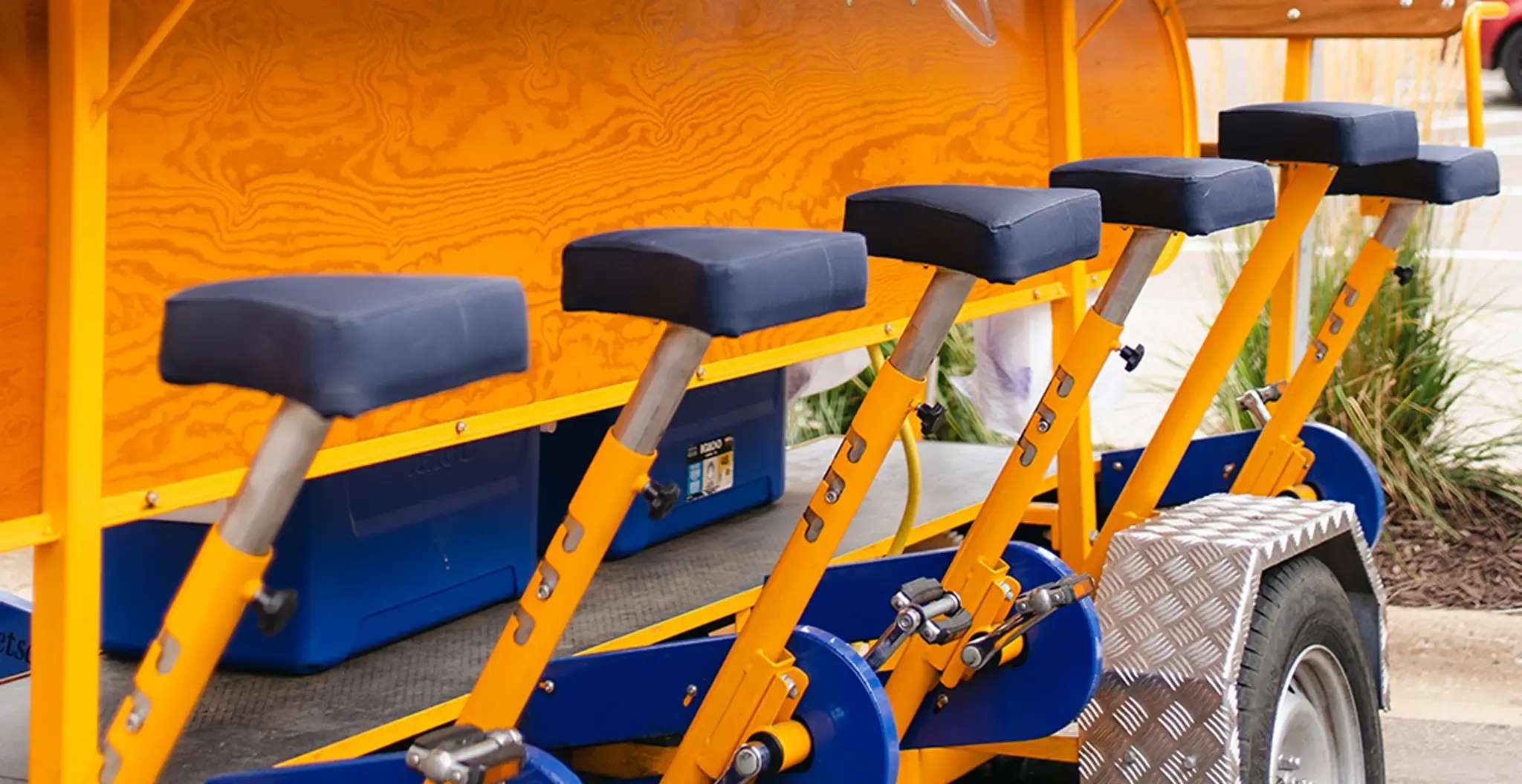 Close-up of Pedal Pub bike seats and pedals ready for riders