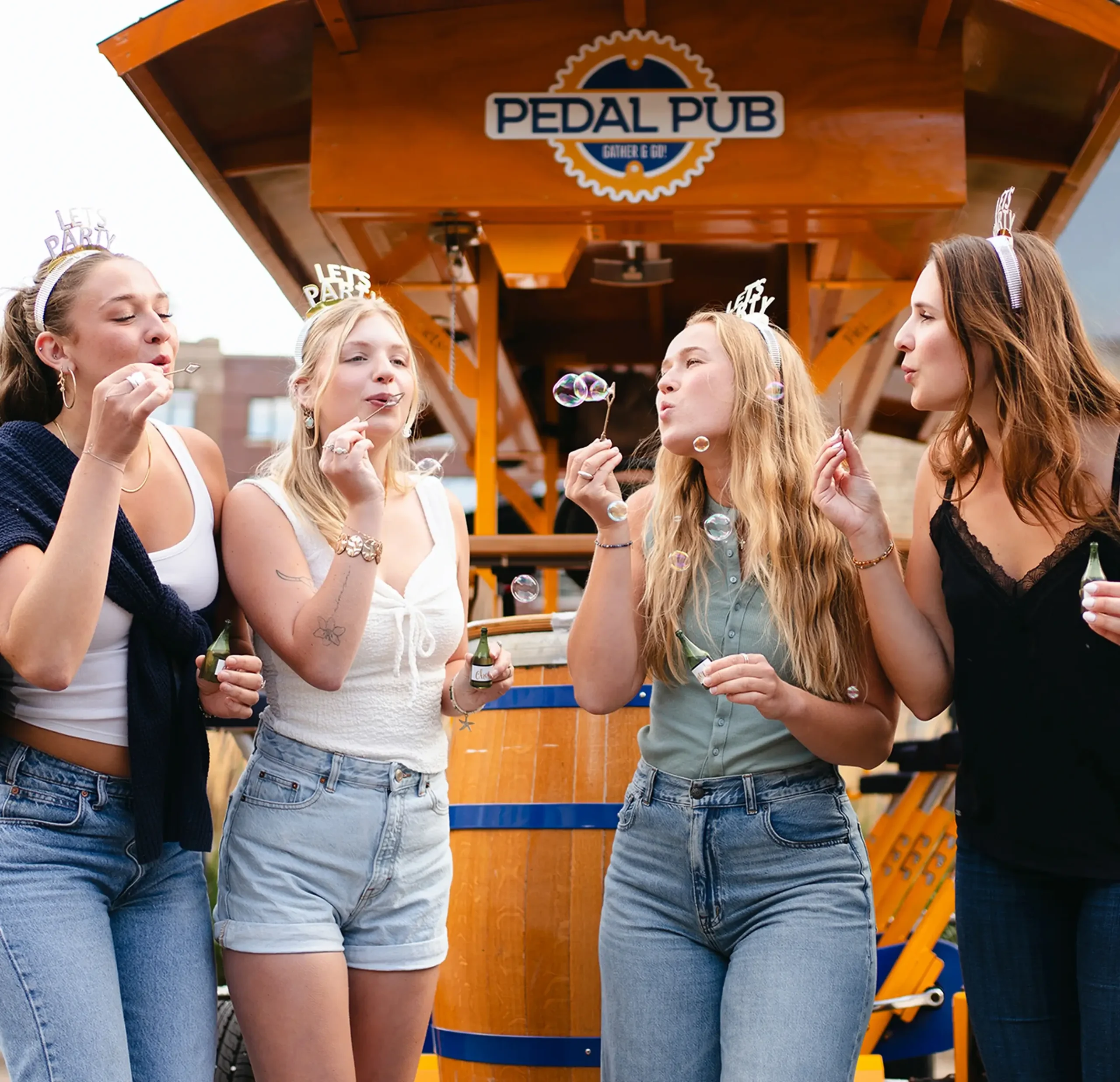 Guests enjoying a ride on a Pedal Pub party bike