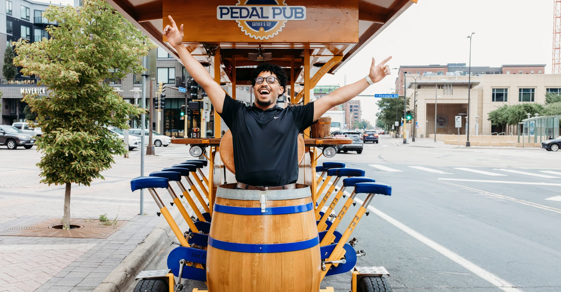 guest inside of party bike barrel