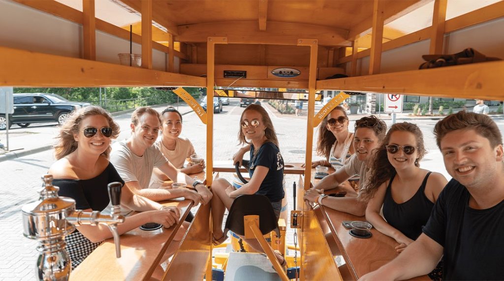 Pedal Pub pilot and passengers