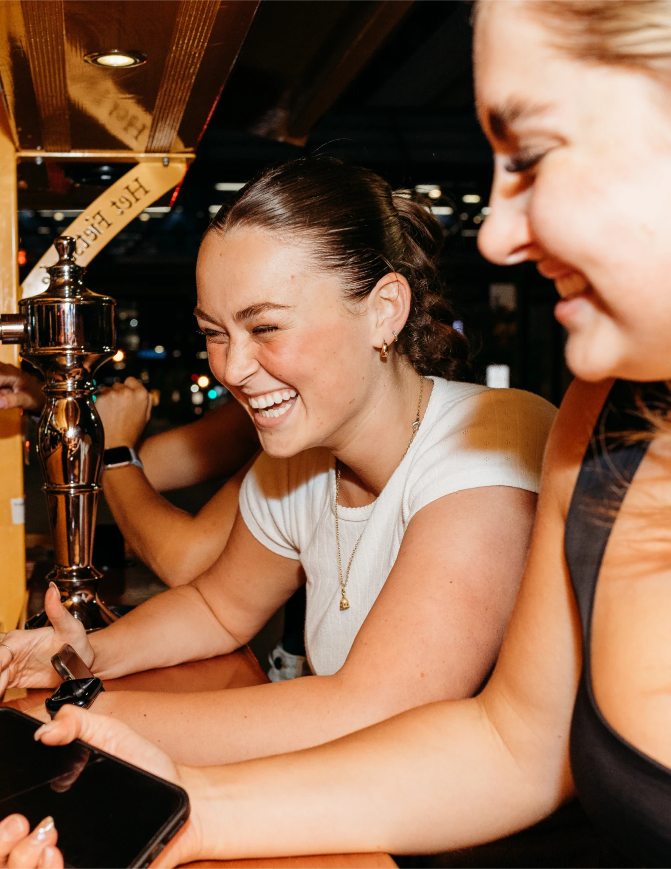 Pedal Pub guests laughing on bike